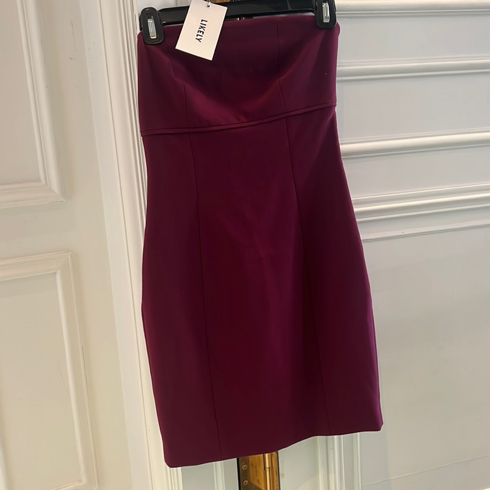 Likely red strapless mini dress. NWT. Never been worn